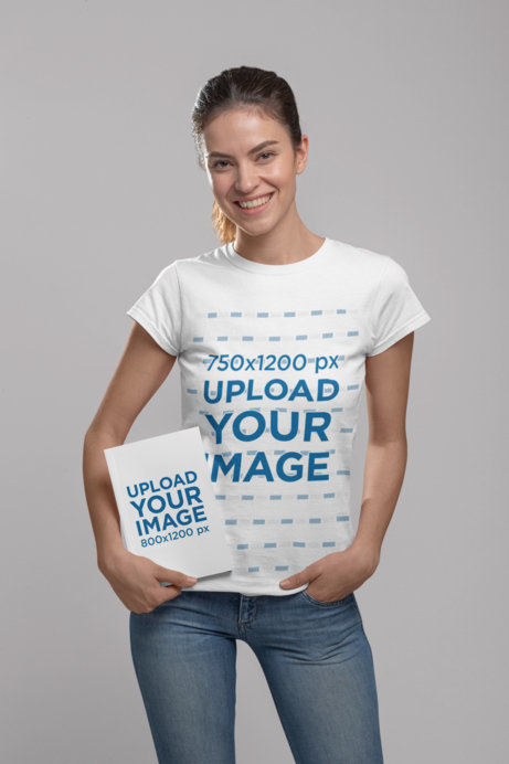 T-Shirt Mockup Featuring a Woman Holding a Book in a Studio
