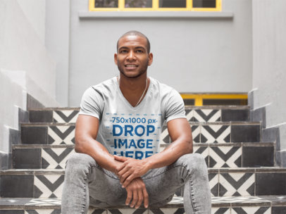 Man Sitting on a Mosaic Tile Staircase T-Shirt Mockup a9355