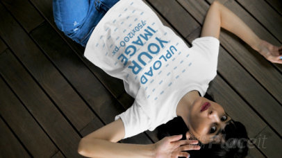 T-Shirt Video of a Woman Lying on a Wooden Floor