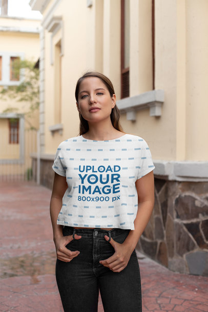 Sublimated Cropped T-Shirt Mockup of a Woman Standing Outside a House