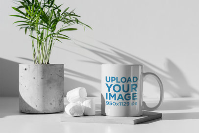 11 oz Mug Mockup Featuring Some Marshmallows and a Concrete Plant Pot 