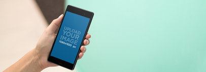 Android Phone Mockup in Front of a Blue Background 