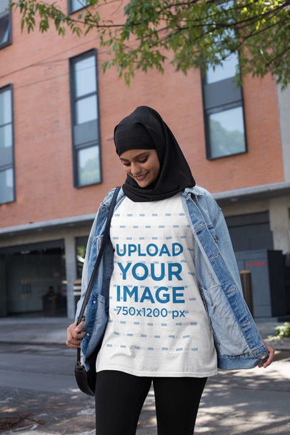 Mockup of a Woman with a Hijab Wearing a Crewneck T-Shirt