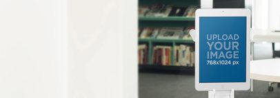 Tablet Mockup of a White iPad Standing on a Table