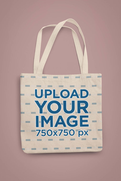 Minimalistic Mockup of a Tote Bag Lying on a Customizable Background
