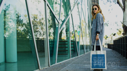 Video of an Elegant Blonde Woman Carrying a Tote Bag 13984