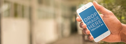 iPhone Mockup of a Guy at School Using an iPhone