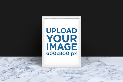Poster Frame Mockup Featuring a Marble Surface and a Black Wall 