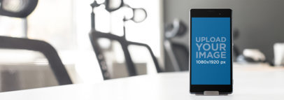 Mockup Template of a Sony Xperia in a Meeting Room Table