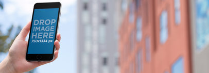 Mockup Template of an iPhone in an Urban Environment 