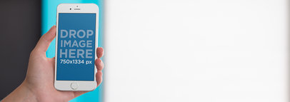 iPhone Mockup of a Woman Watching Television a9505