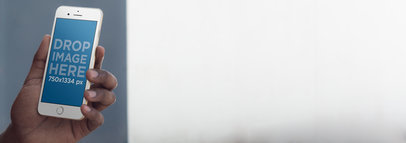 iPhone Mockup of a Man at Home Texting a Friend