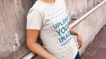 T-Shirt Video of a Woman Casually Leaning on a Hand Rail 12896