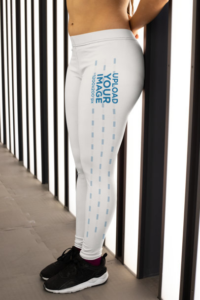Leggings Mockup of a Woman Leaning Against a Wall with Lights 28700