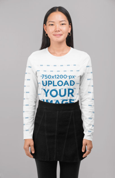Long Sleeve Tee Mockup of a Woman Standing at a Studio