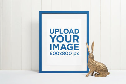 Minimal Picture Frame Mockup Featuring a Rabbit Bronze Sculpture