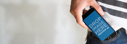 Mockup Template of a Guy in the Street Using an iPhone 