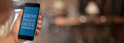 Mockup Template of an iPhone in a Library