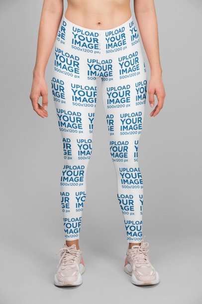 Sublimated Leggings Mockup Featuring a Woman Standing at a Studio