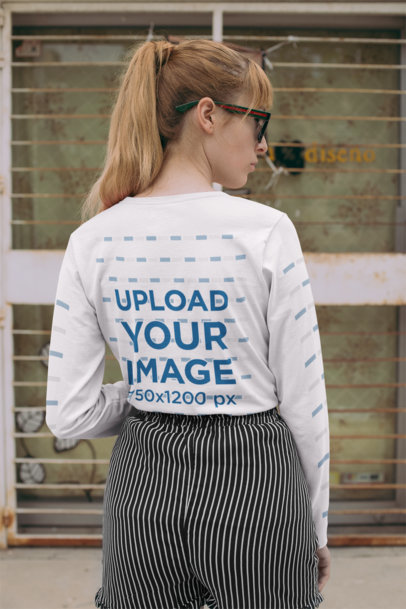 Back View Mockup of a Red-Haired Woman with a Long Sleeve T-Shirt 