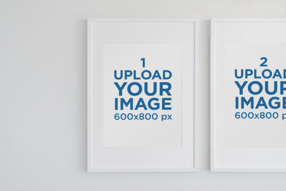 Mockup Featuring Two Art Prints Hanging on a White Wall