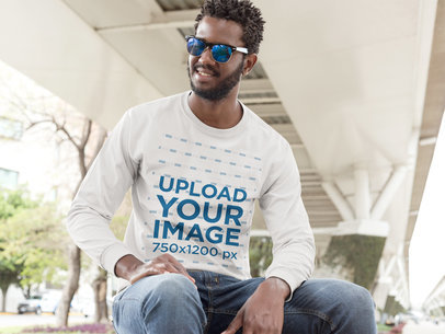 Long Sleeve T-Shirt Mockup of a Man Sitting on a Bench