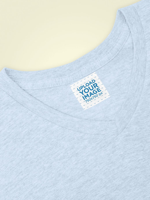 Clothing Label Mockup of a V-Neck T-Shirt on a Customizable Background