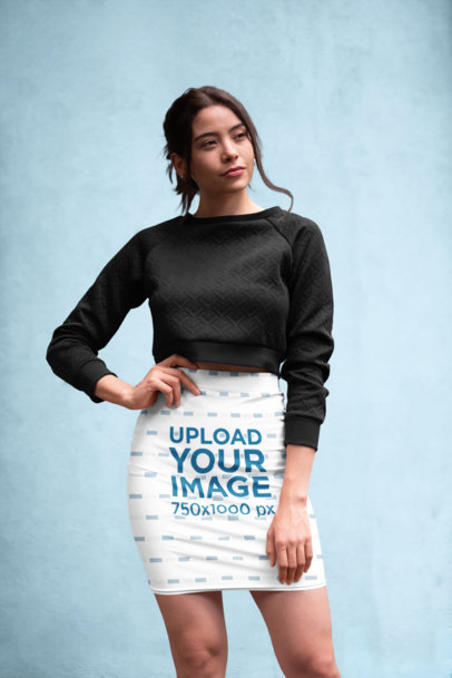 Pencil Skirt Mockup Featuring a Woman Posing Against a Textured Background 