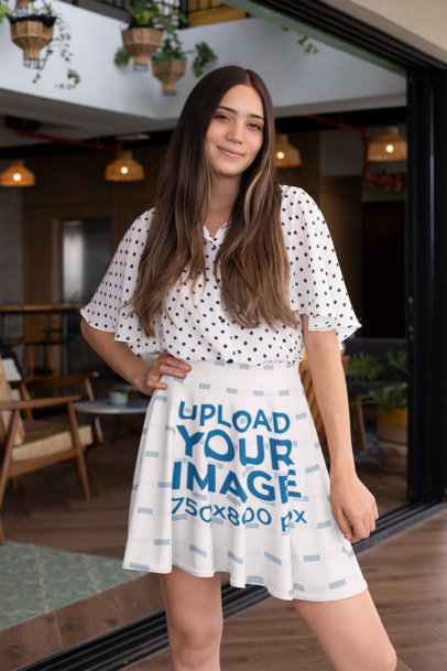 Mockup of a Woman in a Skater Skirt Posing in a Restaurant 