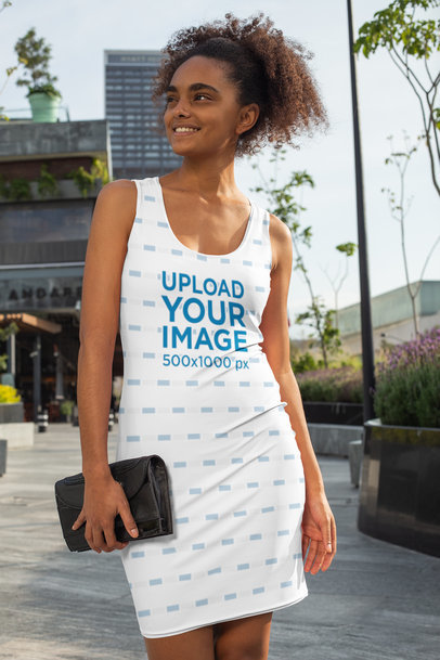 Mockup of a Woman Wearing a Racerback Dress in the City