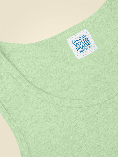 Clothing Label Mockup of a Heathered Tank Top Lying on a Plain Backdrop