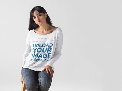 Bella Long Sleeve T-Shirt Mockup of a Woman Sitting on Stool