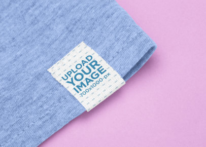 Clothing Label Mockup Featuring a Solid Color Background 