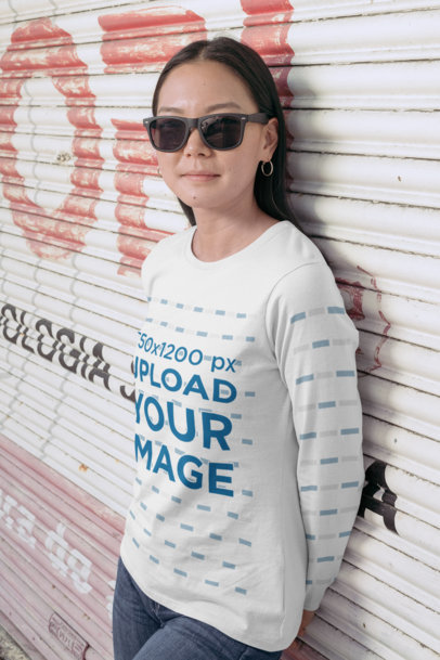 Mockup of a Woman with Sunglasses Wearing a Long Sleeve Tee