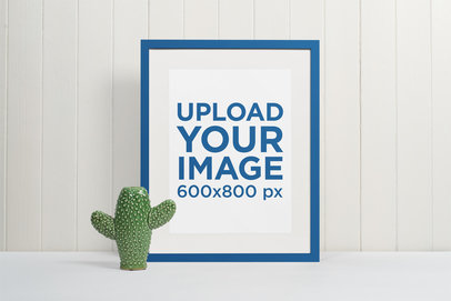 Minimal Picture Frame Mockup Featuring a Ceramic Cactus