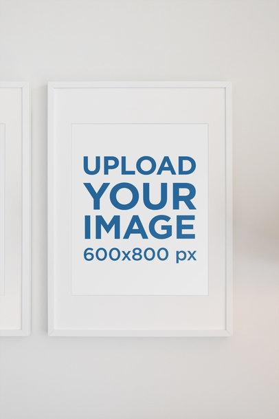 Minimal Poster Frame Mockup Featuring a White Wall 561-el