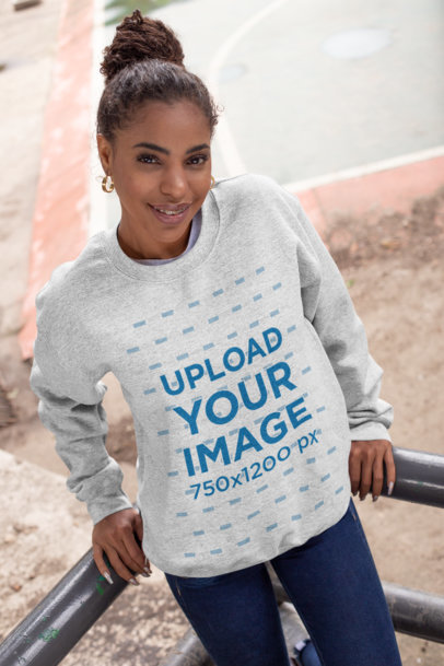 Crewneck Sweatshirt Mockup of a Woman Leaning on a Handrail
