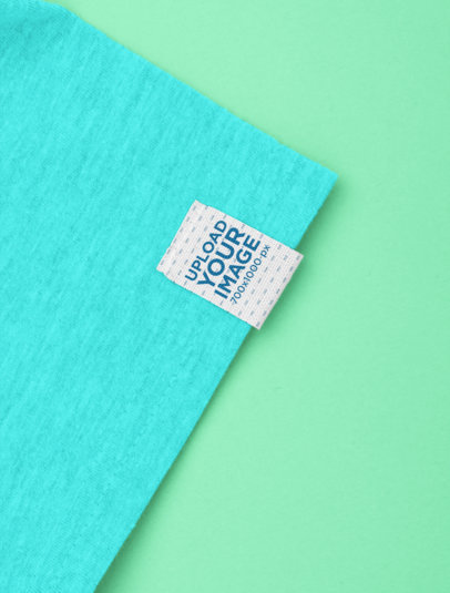 Clothing Label Mockup Featuring the Sleeve of a Heather T-Shirt