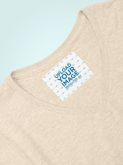 Inside Clothing Label Mockup Against a Flat Surface