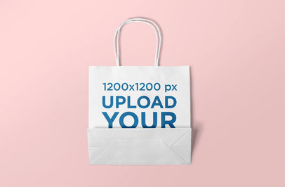 Gift Bag Mockup Displayed over a Minimalist Surface 648-el