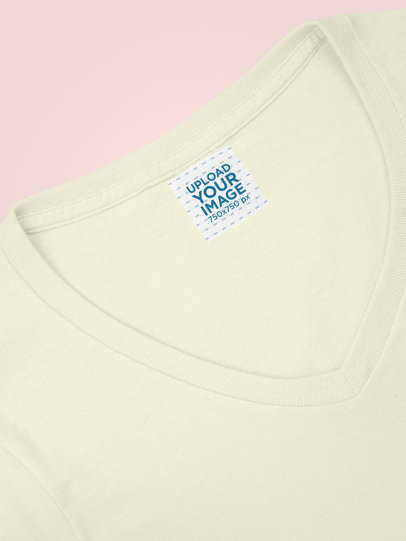 Mockup of a Small Clothing Label Attached to a V-Neck Tee
