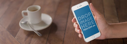 iPhone Mockup of a Man Having a Coffee at a Local Cafe a9784