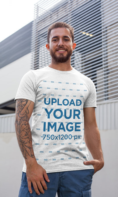 Heathered T-Shirt Mockup of a Tattooed Man Smiling