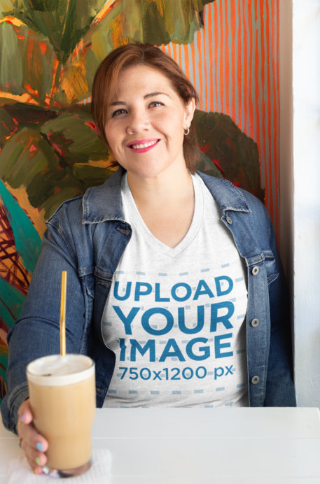 Mockup of a Smiling Woman Wearing a Plus Size Heather T-Shirt 