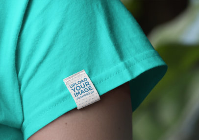Clothing Label Mockup Featuring a Woman Wearing a T-Shirt 