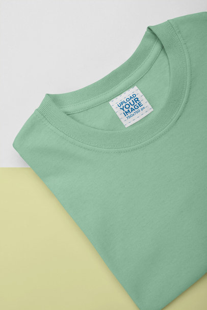 Mockup of an Inside Clothing Label on a Folded Tee 