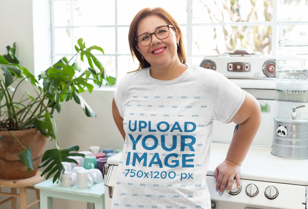 Mockup of a Woman Wearing a Heathered T-Shirt in the Kitchen