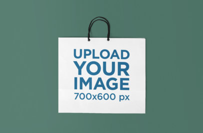 Mockup of a Shopping Bag Lying on a Flat Surface