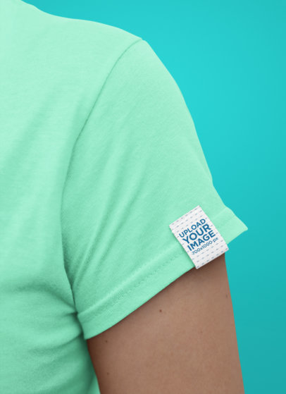  Minimal Mockup of a Clothing Label Attached to a Woman's T-Shirt 