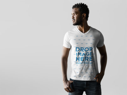 T-Shirt Mockup Featuring a Male Model in a Photoshoot